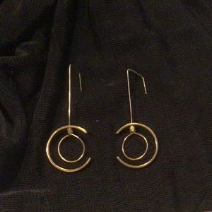Deco Gold tone 1.75” drop earrings with movement of outer & inner circles…